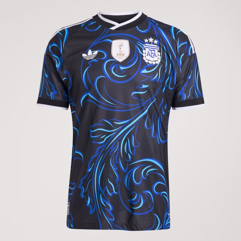 official Argentina 2026 Away Authentic football jersey in black, featuring an intricate blue abstract graphic pattern, the gold FIFA World Champions 2022 patch, and the three-star AFA crest on the chest